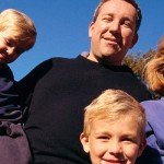 Family in front of their home.